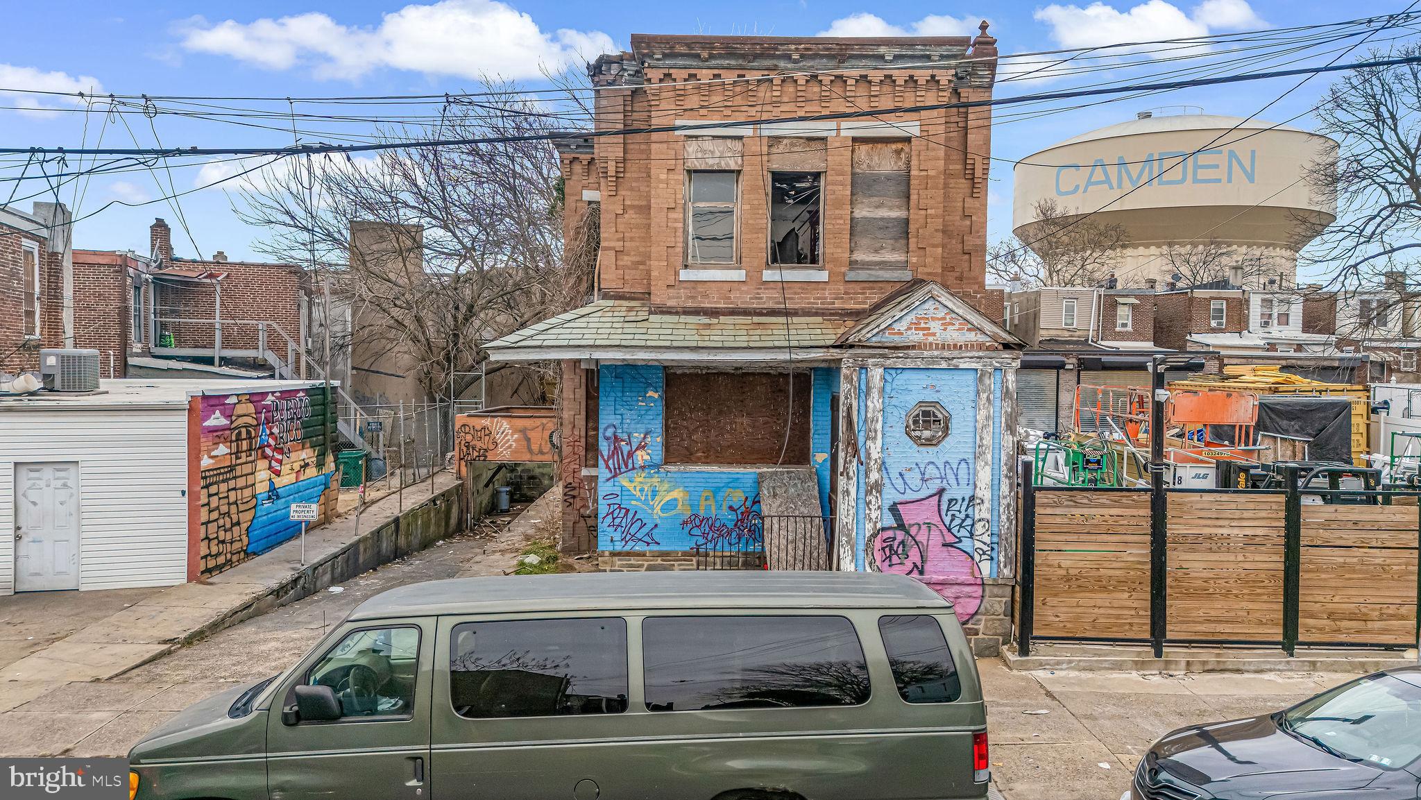 1145 Thurman Street Camden, NJ 08104 - Photo 4 of 18 a front view of a building with large windows