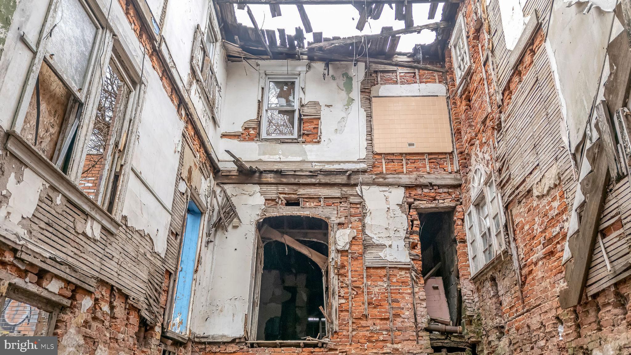 1145 Thurman Street Camden, NJ 08104 - Photo 6 of 18 a close up of a fireplace