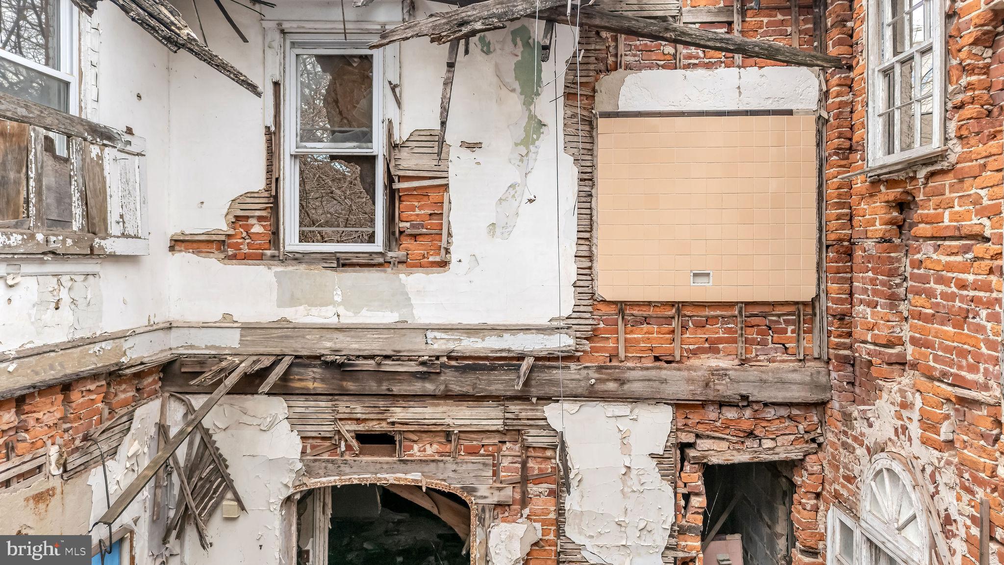 1145 Thurman Street Camden, NJ 08104 - Photo 9 of 18 a view of a kitchen with a sink and cabinets