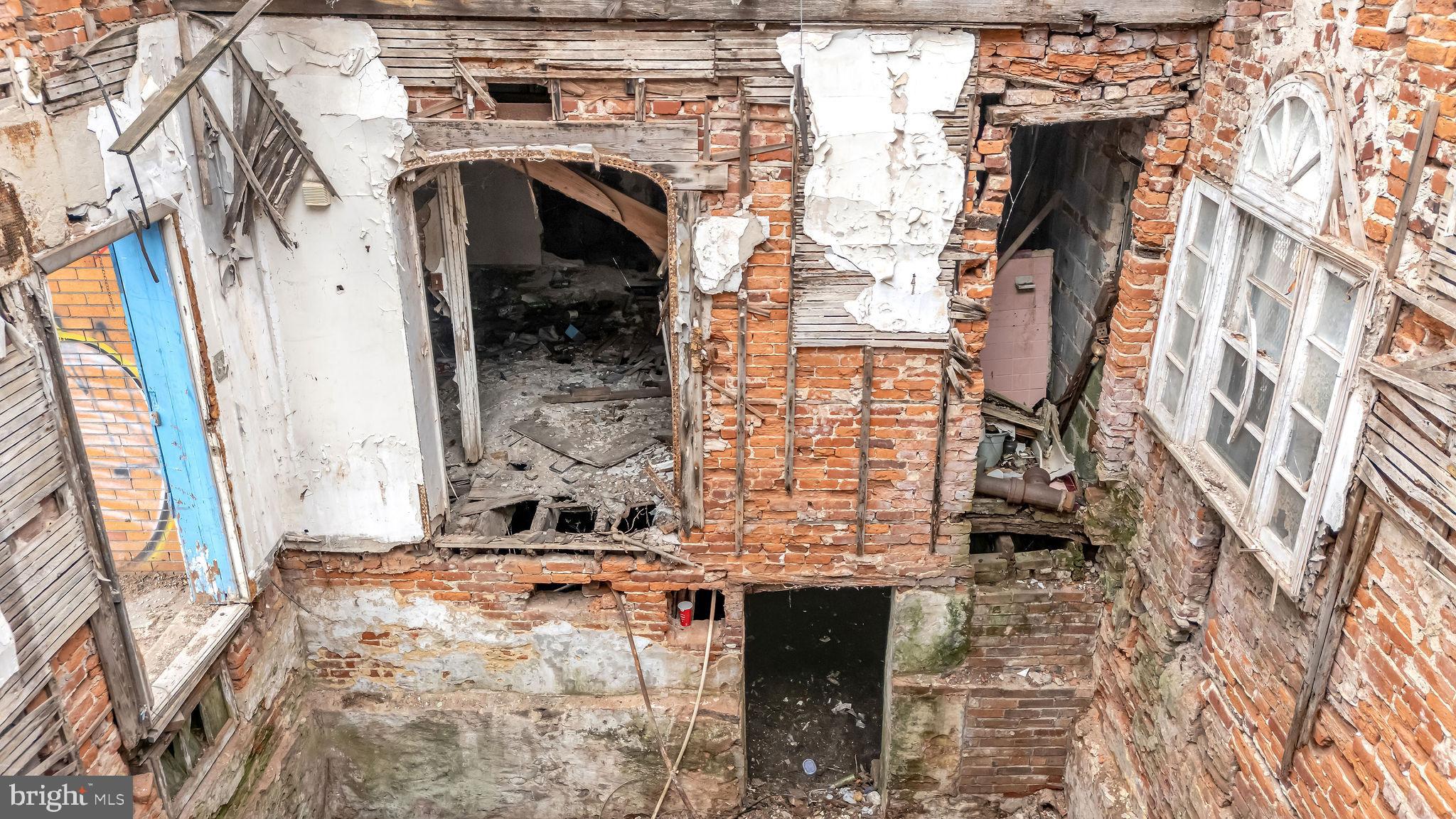 1145 Thurman Street Camden, NJ 08104 - Photo 10 of 18 a view of fireplace with wooden floor