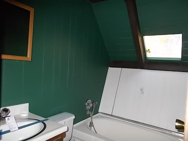 179 Rabbit Foot Trail California Hot Springs, CA 93207 - Photo 2 of 9 a bathroom with a toilet and a sink