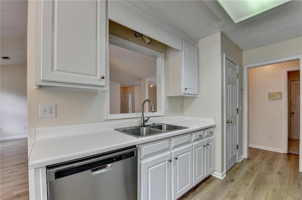601 Bowling Lane Winder, GA 30680 - Photo 21 of 45 a kitchen with a sink and cabinets