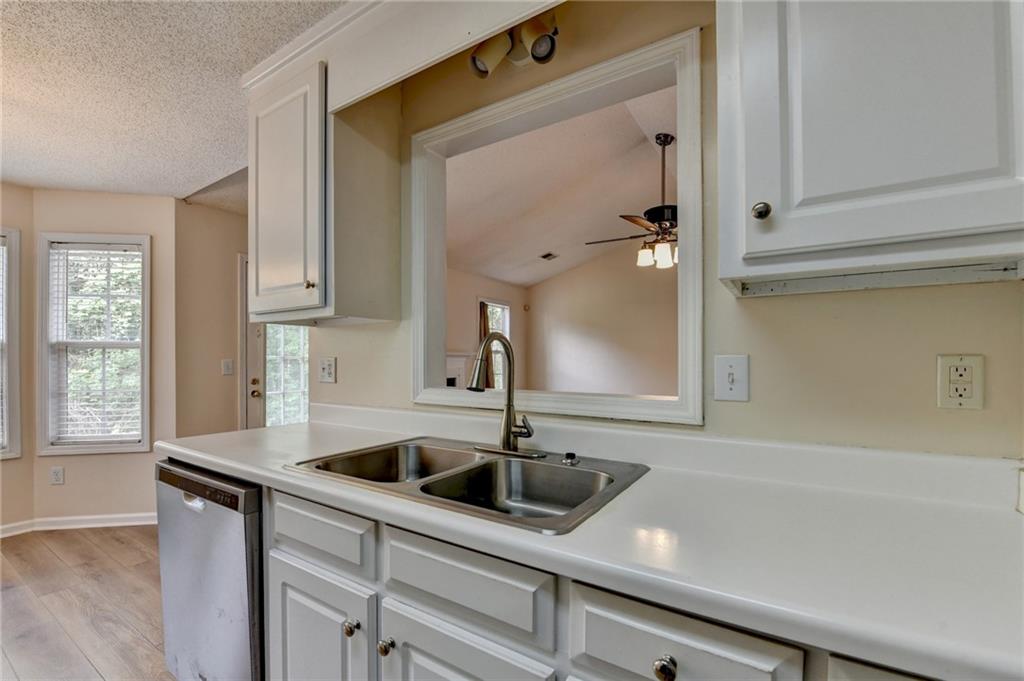601 Bowling Lane Winder, GA 30680 - Photo 24 of 45 a kitchen with a sink and cabinets