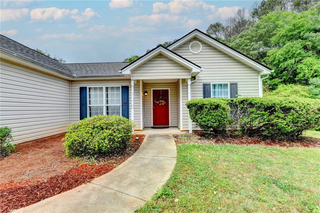 601 Bowling Lane Winder, GA 30680 - Photo 3 of 45 a view of a house with garden