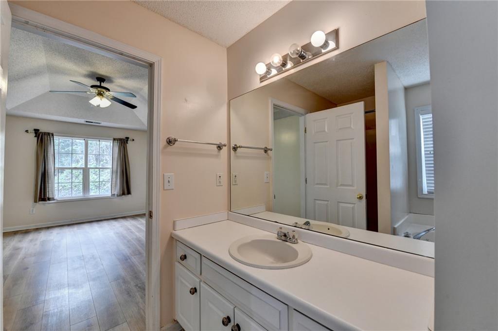 601 Bowling Lane Winder, GA 30680 - Photo 32 of 45 a bathroom with a sink double vanity and a mirror