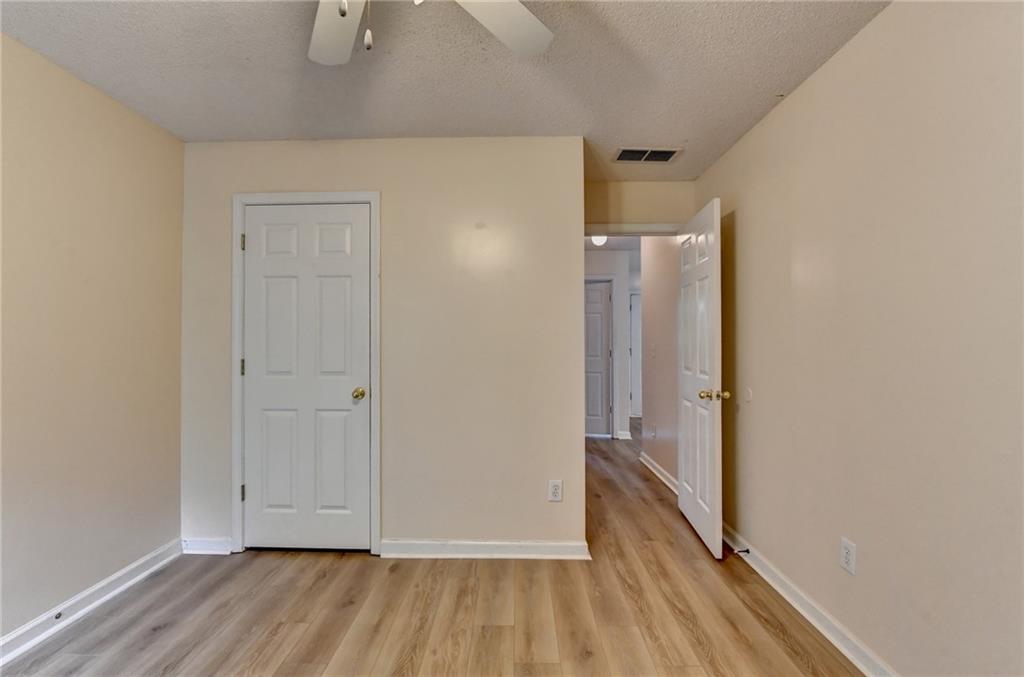 601 Bowling Lane Winder, GA 30680 - Photo 40 of 45 a view of hallway with wooden floor