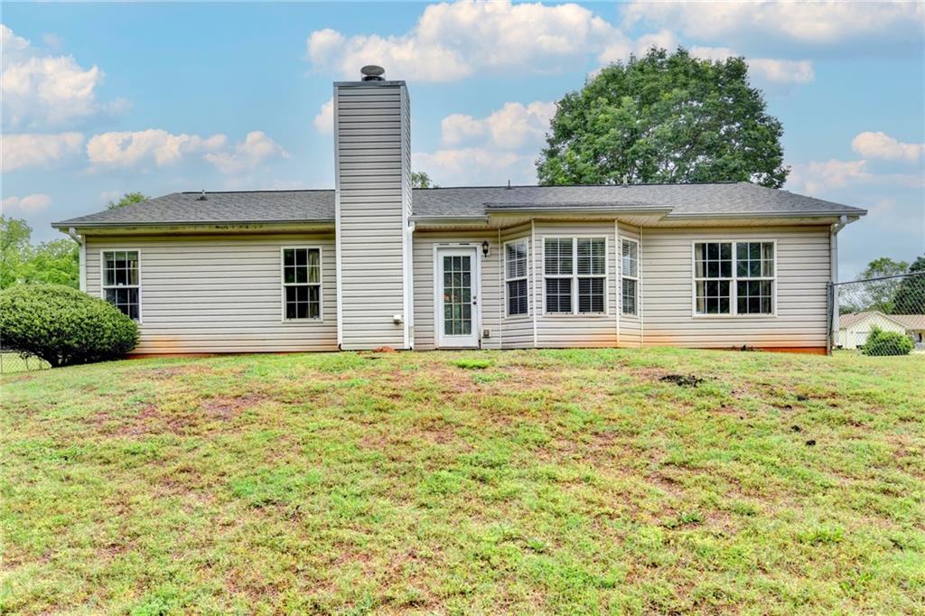 601 Bowling Lane Winder, GA 30680 - Photo 43 of 45 front view of a house with a yard