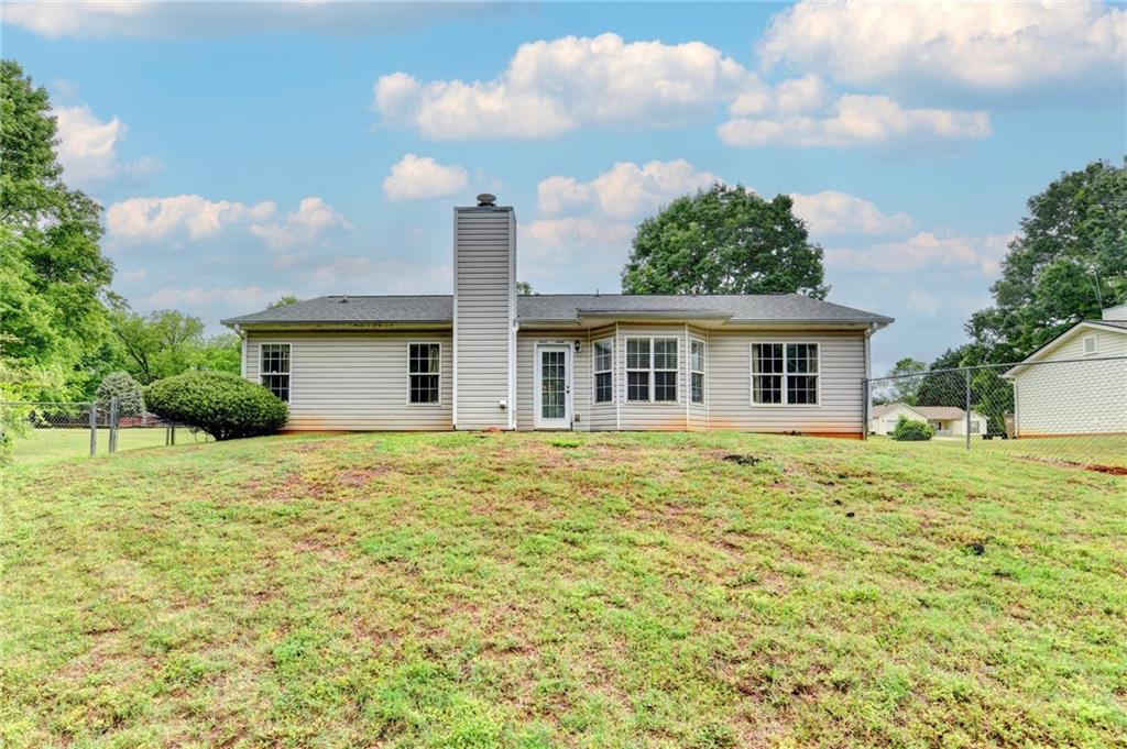 601 Bowling Lane Winder, GA 30680 - Photo 44 of 45 a house view with a garden space