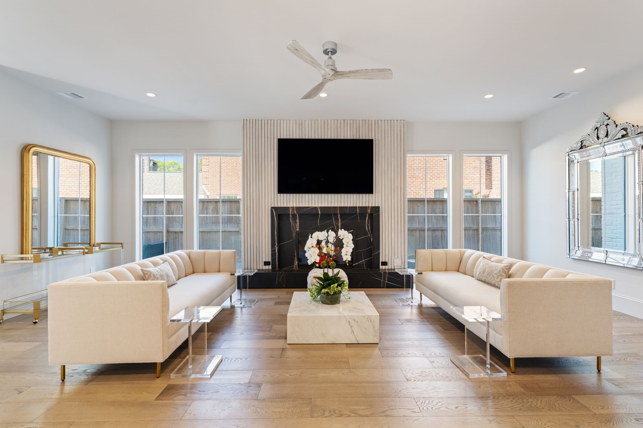 6012 Riverview Way Houston, TX 77057 - Photo 16 of 50 a living room with fireplace furniture and a flat screen tv