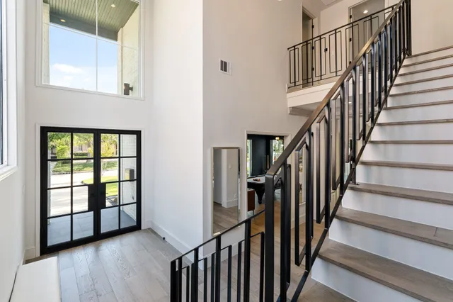 a view of an entryway with wooden floor