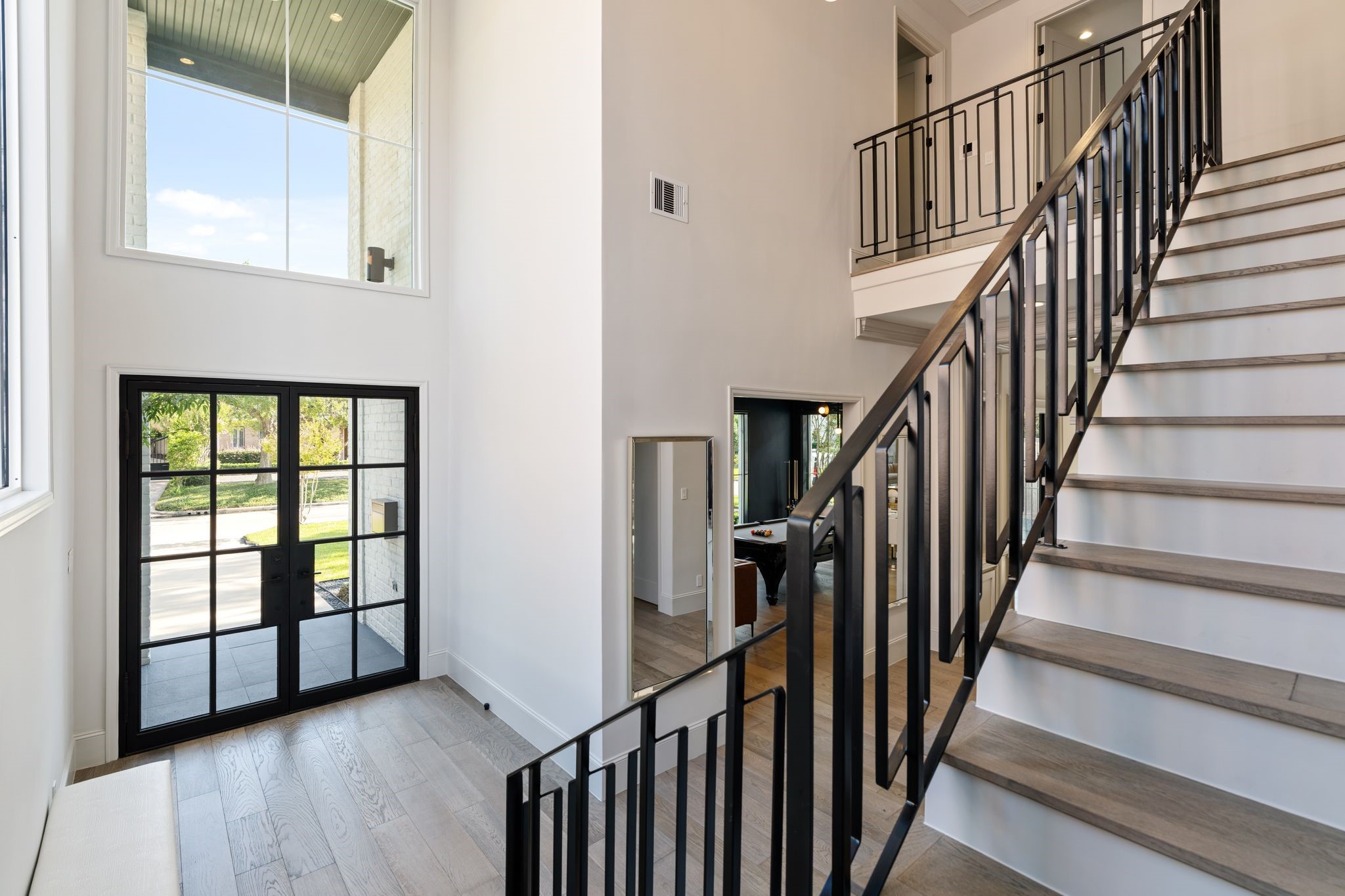 6012 Riverview Way Houston, TX 77057 - Photo 21 of 50 a view of an entryway with wooden floor