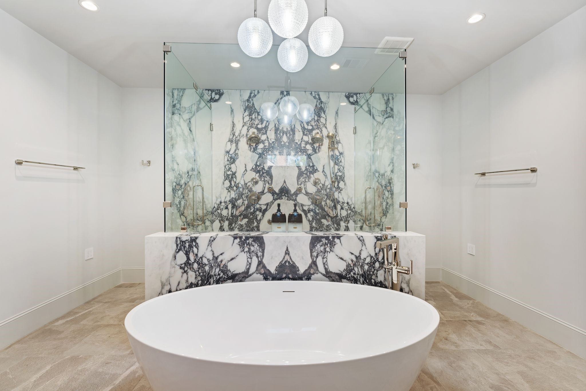 6012 Riverview Way Houston, TX 77057 - Photo 28 of 50 a bathroom with a bathtub and shower