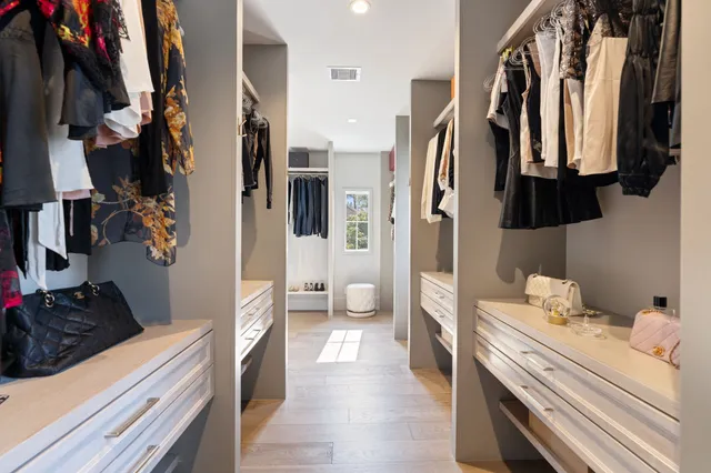 a bathroom with a sink a toilet and a shower