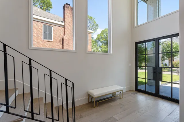 a view of a hallway with windows