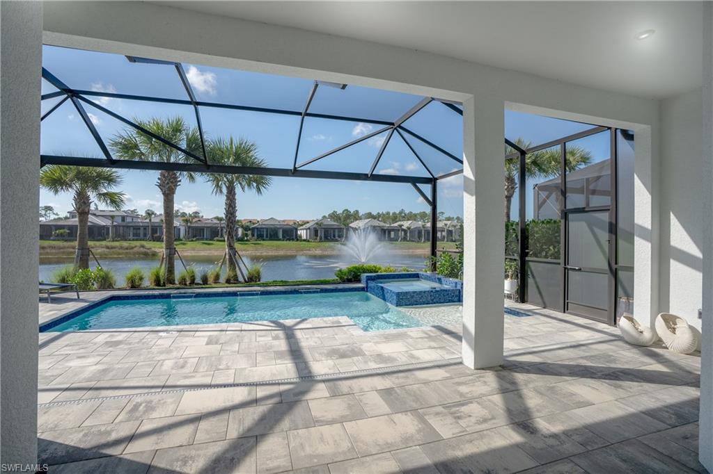 9560 Caymas Terrace Naples, FL 34114 - Photo 11 of 40 a view of swimming pool with a patio