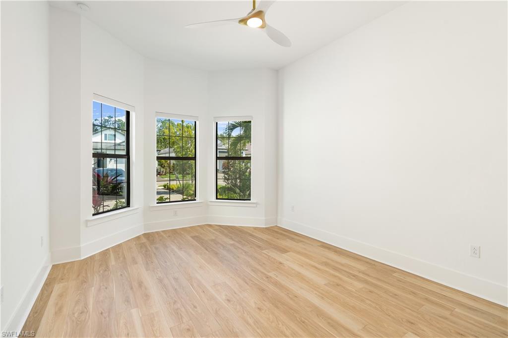 9560 Caymas Terrace Naples, FL 34114 - Photo 17 of 40 an empty room with windows