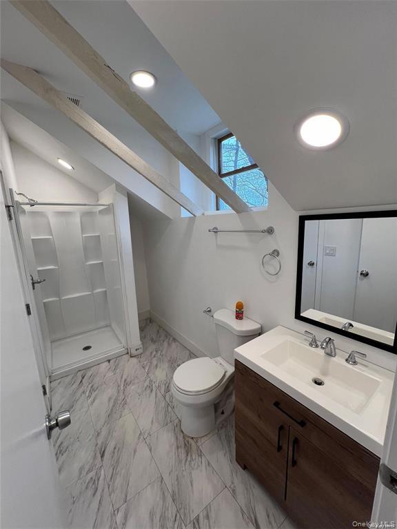 493 Munsell Road East Patchogue, NY 11772 - Photo 12 of 14 a bathroom with a sink toilet and shower