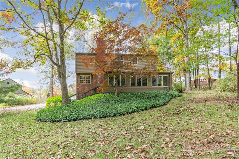 3890 Anderson Road Gibsonia, PA 15044 - Photo 23 of 25 Four Season room overlooks the wooded back yard.