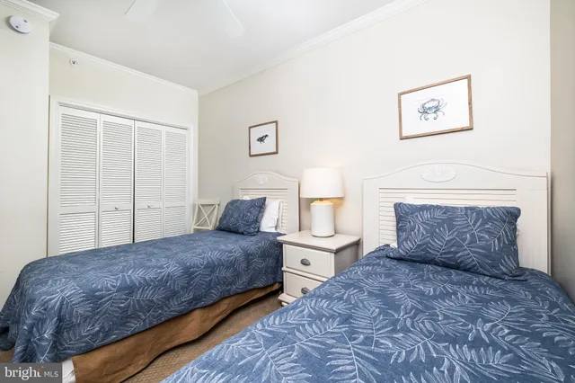 a bedroom with a large bed and a couch