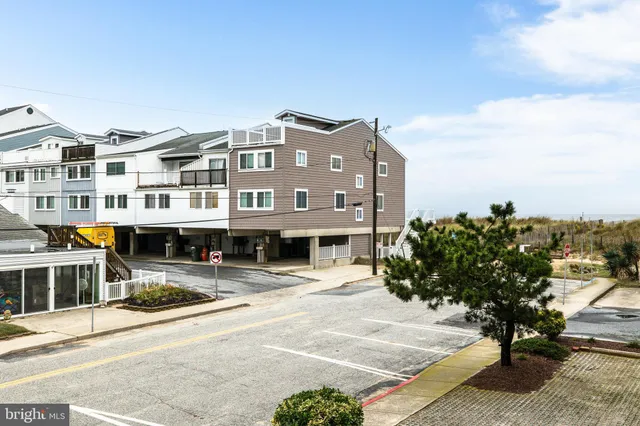 a front view of a building with street view