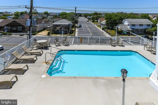 an aerial view of a house with a ocean view