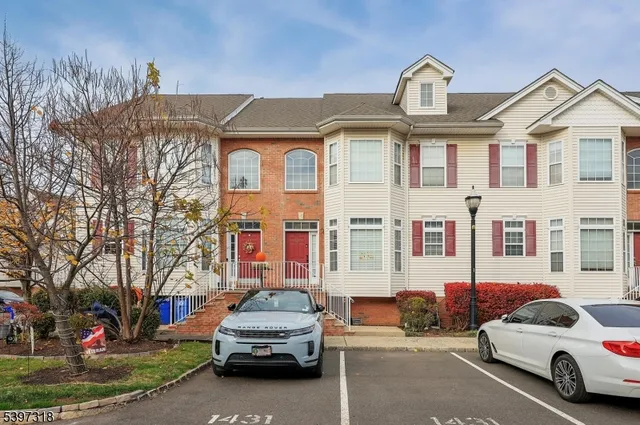 a car parked in front of a house