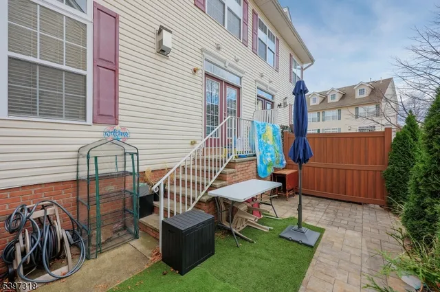 a view of a chairs in the patio