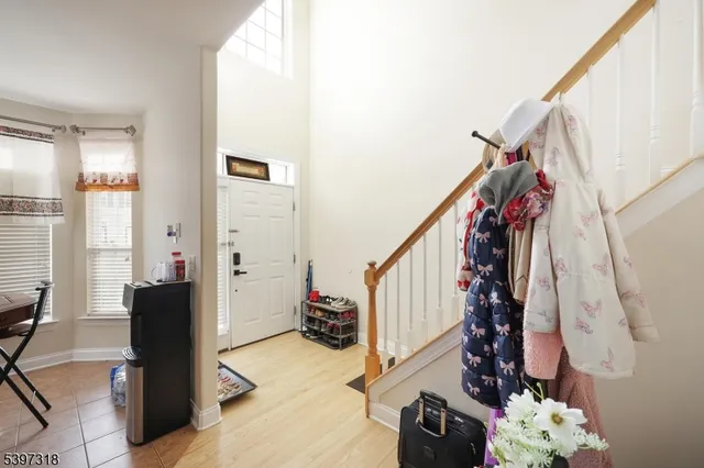 a view of entryway with wooden floor