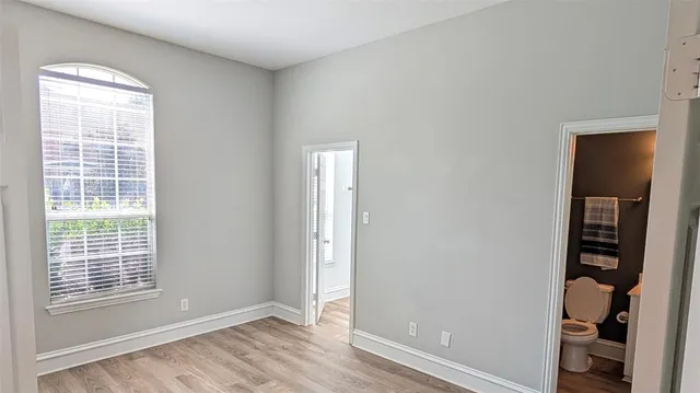 a view of an empty room with a window