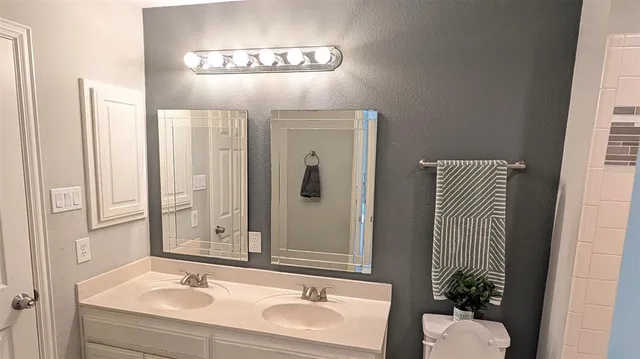 a view of a porch with wooden floor and windows