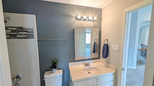 a view of a hallway with staircase