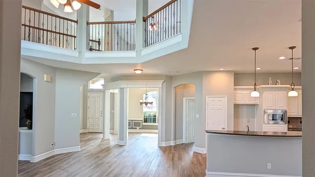 a kitchen with a sink and a fireplace