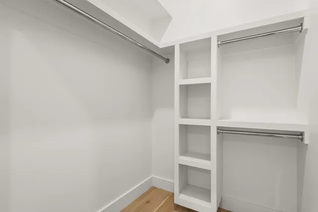 a view of an empty walk in closet