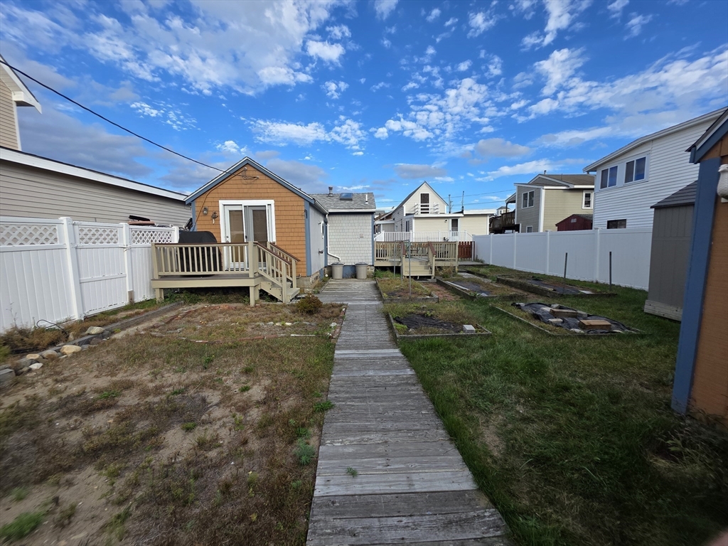 101 Cable Avenue Salisbury, MA 01952 - Photo 12 of 16 a front view of a house with a yard