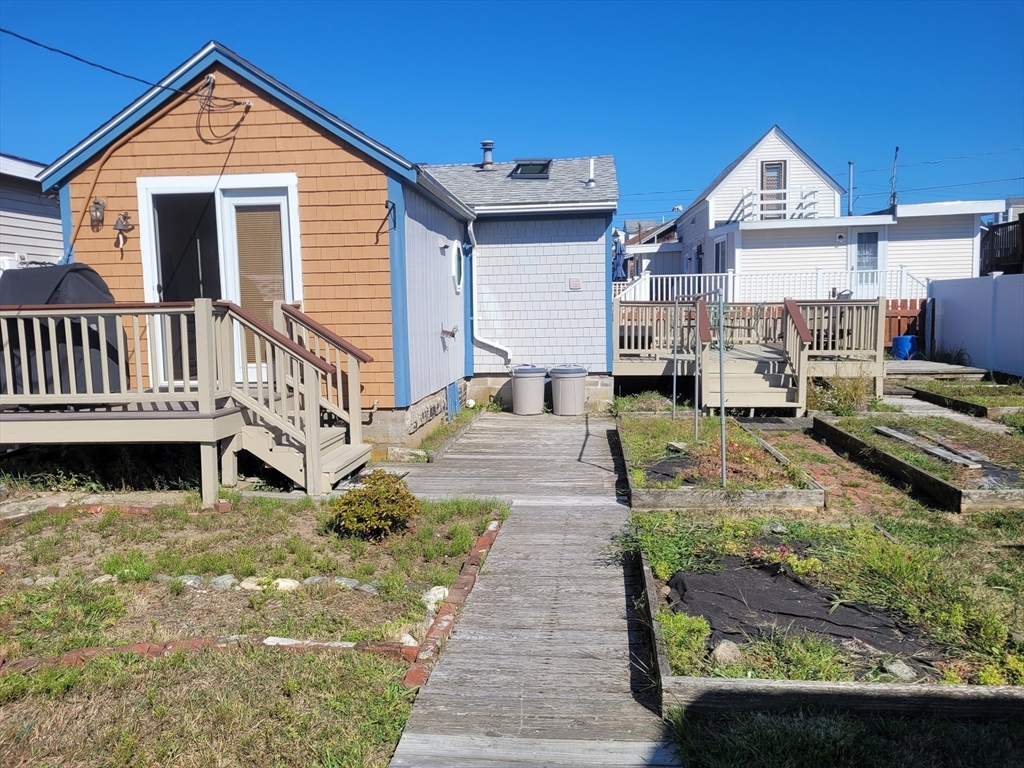 101 Cable Avenue Salisbury, MA 01952 - Photo 2 of 16 a front view of a house with a yard
