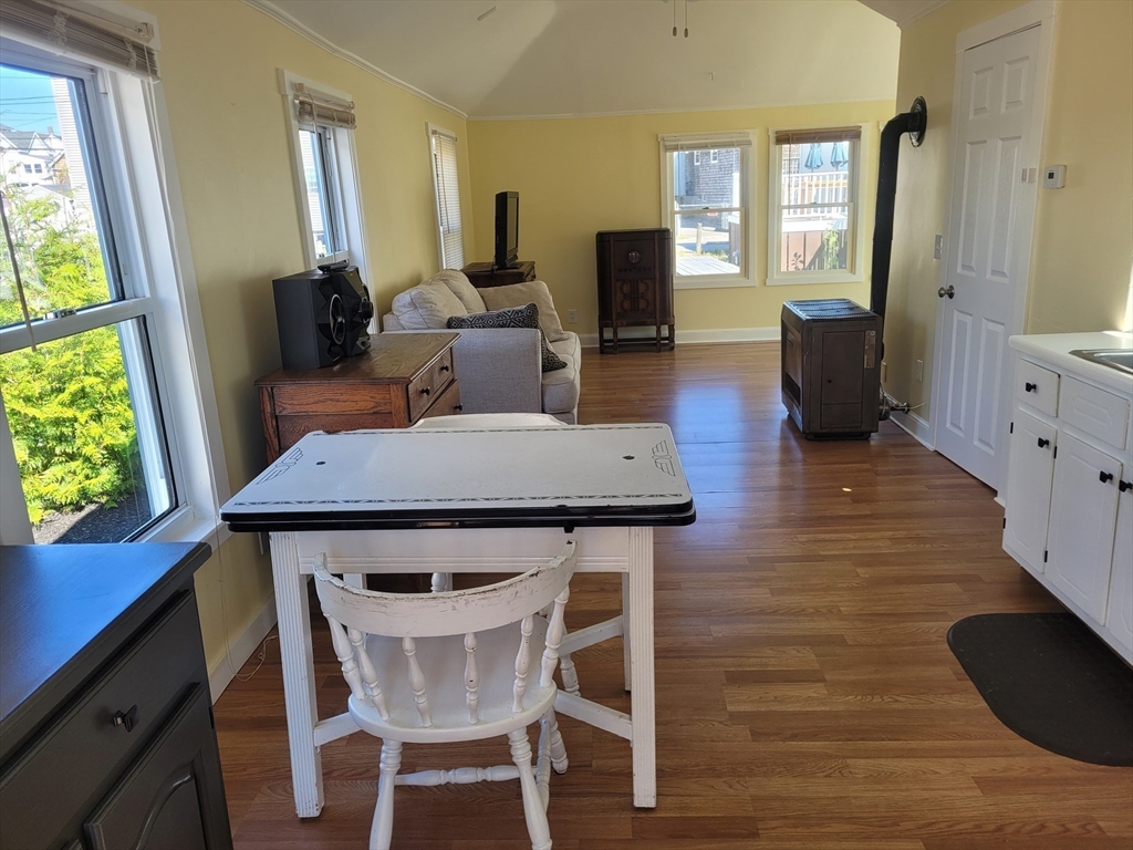 101 Cable Avenue Salisbury, MA 01952 - Photo 4 of 16 a view of a dining room with furniture and wooden floor