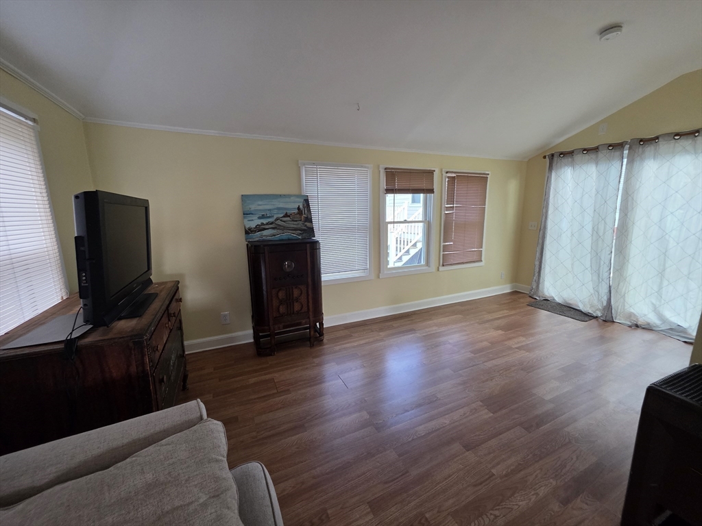 101 Cable Avenue Salisbury, MA 01952 - Photo 5 of 16 a living room with furniture and a flat screen tv
