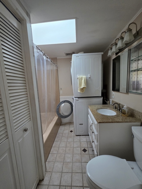 101 Cable Avenue Salisbury, MA 01952 - Photo 7 of 16 a bathroom with a toilet sink and mirror