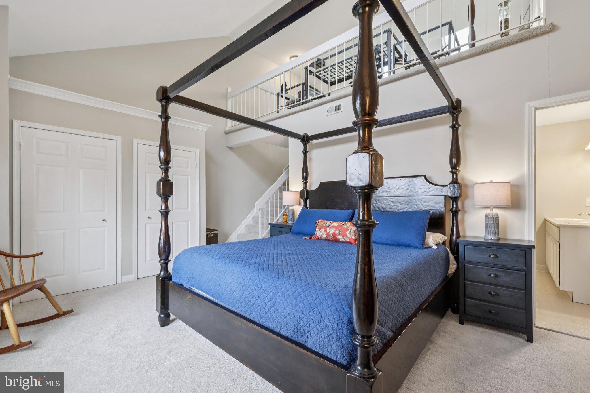 11 Old Forge Garth Sparks Glencoe, MD 21152 - Photo 14 of 39 a bedroom with a bed and a chandelier