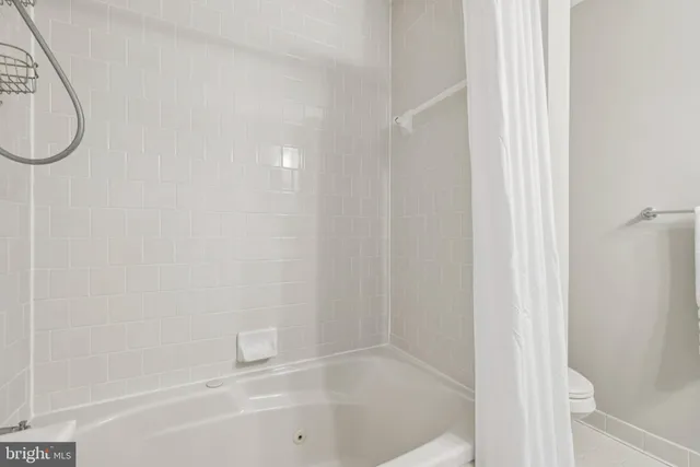 a view of staircase with white walls