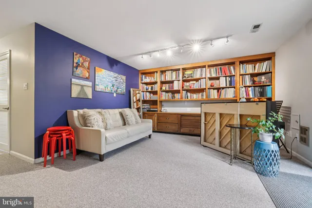 a bed room with furniture and a fireplace