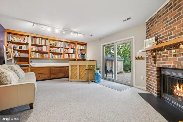 a view of livingroom with furniture and fireplace