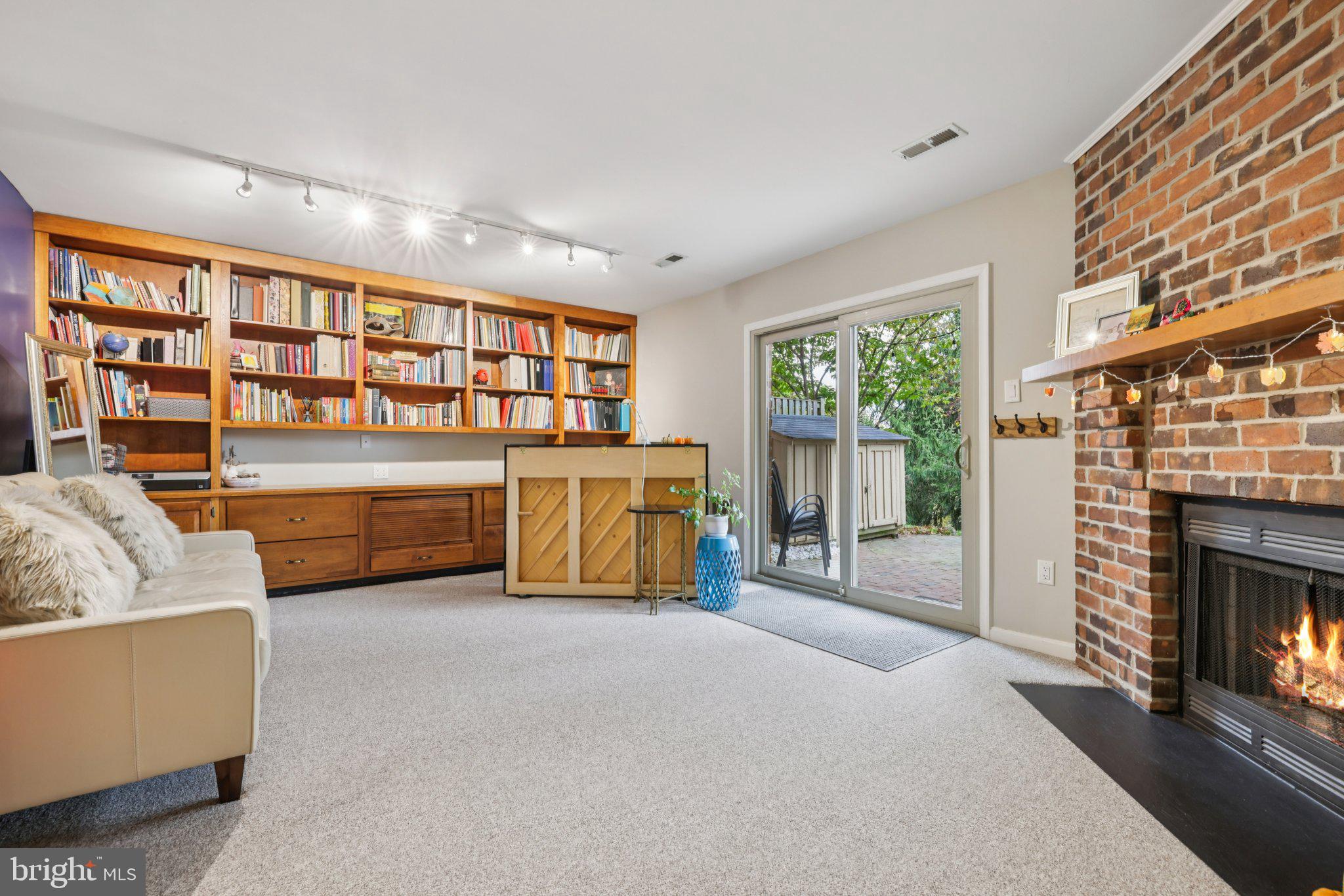 11 Old Forge Garth Sparks Glencoe, MD 21152 - Photo 23 of 39 a bed room with furniture and a fireplace