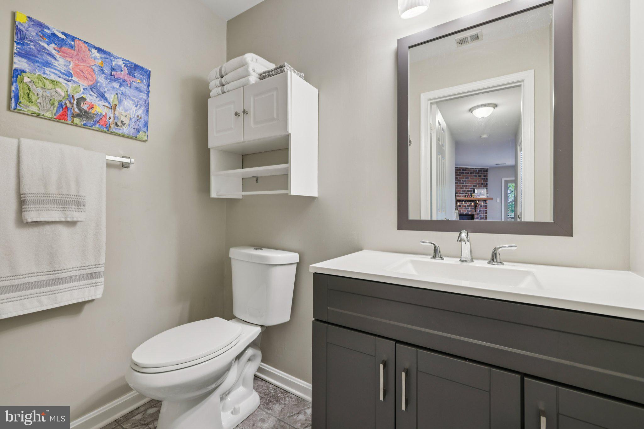 11 Old Forge Garth Sparks Glencoe, MD 21152 - Photo 26 of 39 a bathroom with a toilet sink and mirror