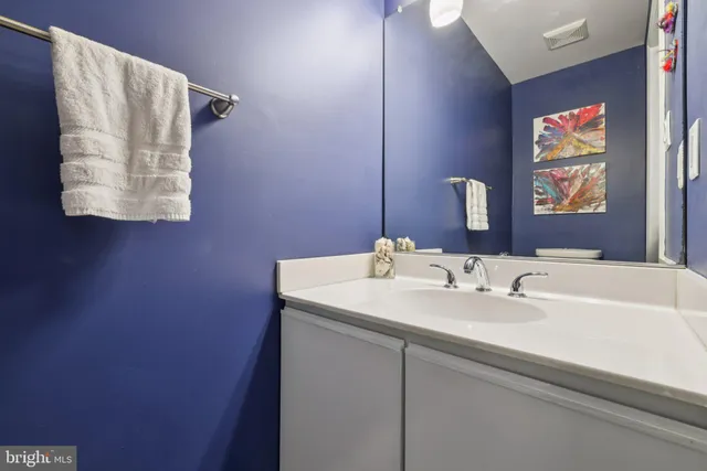 a view of a hallway with large windows