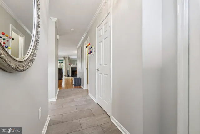 a bedroom with furniture and a fireplace