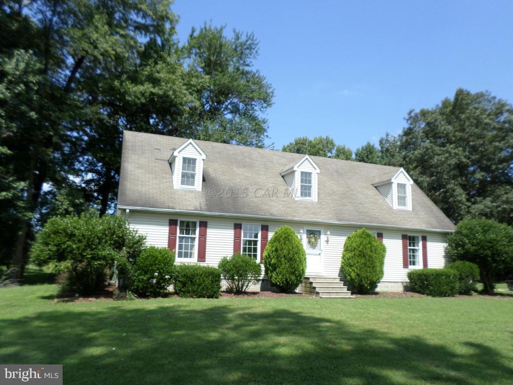 9018 Bethel Road Willards, MD 21874 - Photo 36 of 42 a front view of a house with garden