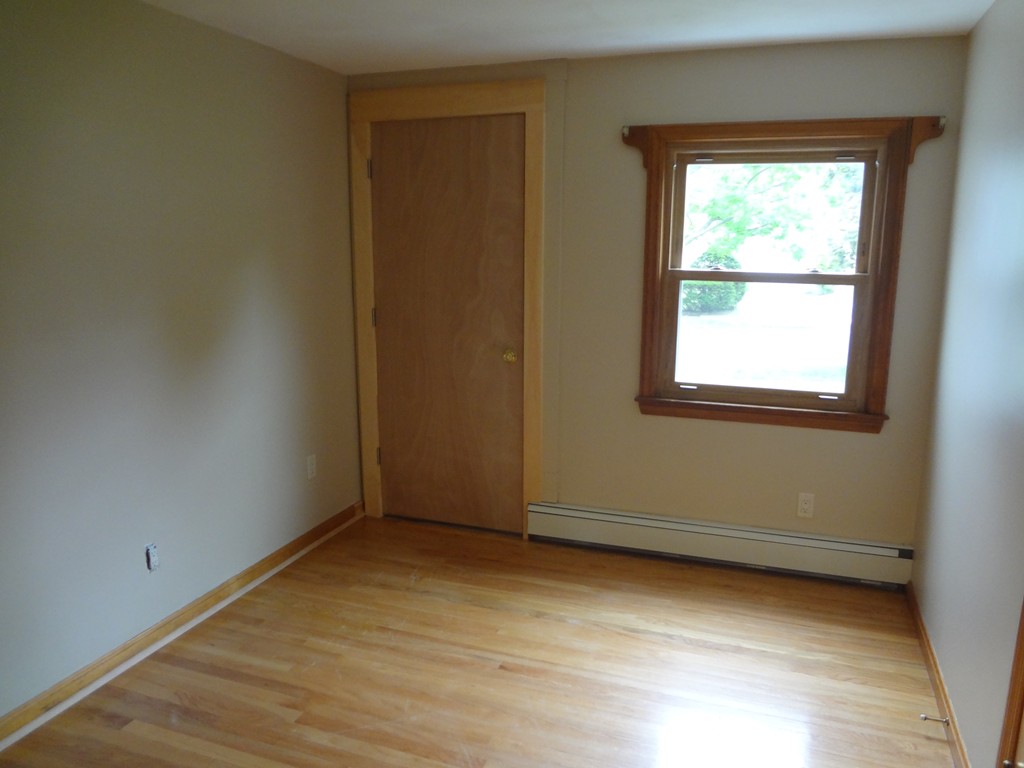 27 Bennington Street Springfield, MA 01108 - Photo 12 of 20 an empty room with a window