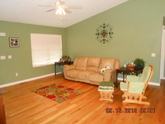 7063 Oak Springs Road Nunnelly, TN 37137 - Photo 5 of 16 livingroom, hardwod floors