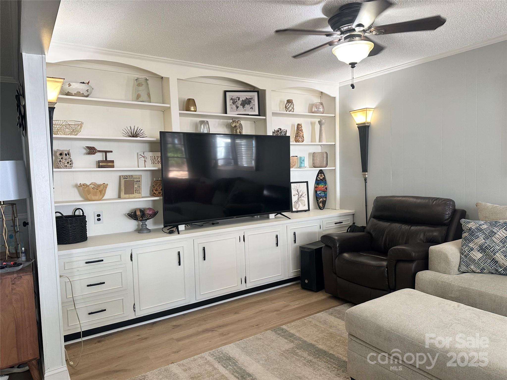 400 Charles Street Spencer, NC 28159 - Photo 15 of 26 a living room with furniture and a flat screen tv